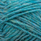 Close-up of a bundle of Léttlopi (Lite Lopi) Icelandic Wool Yarn in varying shades of teal and turquoise from Berroco, Inc. The fibers are slightly fuzzy, giving a soft and textured appearance. The yarn is wrapped loosely, showcasing its thickness and individual strands, perfect for colorwork knitting or durable garments.