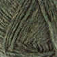 Close-up of a ball of Léttlopi (Lite Lopi) Icelandic Wool Yarn by Berroco, Inc., showcasing the intricate detail of the fibers and strands wrapped around each other. This yarn, perfect for creating durable garments and intricate colorwork knitting, features a blend of lighter and darker green hues that give it a textured and slightly fuzzy appearance.