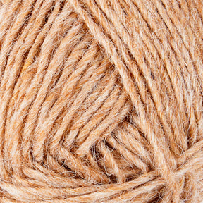 Close-up image of a ball of light brown Léttlopi (Lite Lopi) Icelandic Wool Yarn by Berroco, Inc., featuring tightly wound strands that highlight its fibrous texture and intricate pattern, making it ideal for colorwork knitting projects.