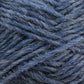 A close-up shot of a tangled pile of Léttlopi (Lite Lopi) Icelandic Wool Yarn by Berroco, Inc. shows the clearly visible fibers. The yarn features a mix of slightly different shades of blue, giving it a textured and soft appearance perfect for colorwork knitting projects.