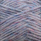 Close-up of Berroco, Inc.'s Léttlopi (Lite Lopi) Icelandic Wool Yarn, featuring a blend of blue, gray, and pink fibers. This fluffy yarn with loosely twisted strands offers a cozy and inviting texture ideal for colorwork knitting.