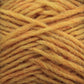 Close-up image of a bundle of Berroco, Inc.'s Léttlopi (Lite Lopi) Icelandic Wool Yarn. The warm, golden-orange fibers are slightly fuzzy, revealing a soft texture with small variations in shades ranging from light to medium orange hues. Made from authentic Icelandic wool, the yarn is neatly wound in crisscrossing strands perfect for creating durable garments.