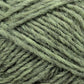 Close-up of several strands of the light green Léttlopi (Lite Lopi) Icelandic Wool Yarn by Berroco, Inc., intricately intertwined and showcasing the texture and fibers perfect for colorwork knitting.