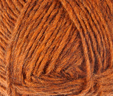 Close-up image of a ball of thick, textured yarn in a rich, warm orange color. The Léttlopi (Lite Lopi) Icelandic Wool Yarn by Berroco, Inc. is neatly wound, displaying the intricate fibers and texture, perfect for durable garments or colorwork knitting.