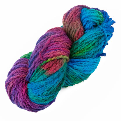 A skein of Great Adirondack Galloway by Great Adirondack Yarn Co, Inc. features vibrant jewel-tones of blue, green, purple, and red. The merino yarn is twisted into a neat bundle, showcasing its rich and varied hues against a plain white background.