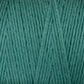 Close-up image of Great Northern Weaving's Cotton Carpet Warp 8/4 yarn, tightly wound in neat parallel strands with a slight crisscross pattern. The texture appears soft and slightly fuzzy, ideal for crafting vibrant coverlets. The image emphasizes the uniformity and vivid teal color of the yarn.