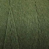 A close-up view of a thick spool of Great Northern Weaving's Cotton Carpet Warp 8/4 in green. The tightly wound fibers show a slightly fuzzy texture, perfect for crafting rag rugs or coverlets. The yarn appears to be of medium weight and has a natural, muted green color.