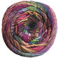 A close-up image of a skein of Noro Ito yarn. The yarn, from the Knitting Fever / Euro Yarns brand, showcases a variety of vibrant hues including pink, purple, blue, green, and brown, all blending together in a spiral pattern. The textures appear soft and thick, making it suitable for knitting or crocheting projects.