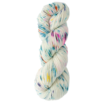 The Happy Feet Sock Yarn by Plymouth Yarn Co. features soft Merino wool with vibrant speckles of blue, pink, orange, and yellow. It is twisted neatly against a plain white background, and its exquisite stitch definition adds elegance to any project.