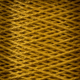 A close-up image of tightly wound 3/2 Pearl Cotton Yarn | Mini-cone by Supreme Corp in a vibrant yellow color. The strands of the yarn are crisscrossed in a detailed, repeating pattern, creating a textured appearance. The photo captures the intricate lines and fibrous texture of this versatile pearl cotton yarn.