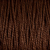 Close-up view of tightly coiled dark brown strands from Supreme Corp’s 3/2 Pearl Cotton Yarn | Mini-cone, showcasing a textured and rich fiber pattern. This versatile yarn is densely woven, creating a uniform appearance with subtle highlights and shadows.