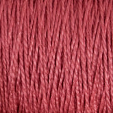 Close-up image of Supreme Corp's 3/2 Pearl Cotton Yarn Mini-cone in vibrant red, showcasing the tightly wound strands and intricate fibrous details of the material. The yarn appears to be soft and smooth, making it perfect for knitting or crocheting projects.