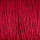 Close-up of vibrant red 3/2 Pearl Cotton Yarn from Supreme Corp tightly wound together, showcasing its smooth texture and consistent thickness. The large cone of mercerized yarn has a shiny finish, reflecting light and emphasizing its rich color and fine detail.