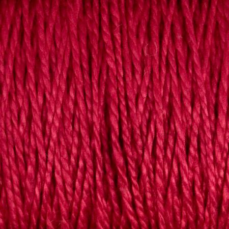 Close-up of vibrant red 3/2 Pearl Cotton Yarn from Supreme Corp tightly wound together, showcasing its smooth texture and consistent thickness. The large cone of mercerized yarn has a shiny finish, reflecting light and emphasizing its rich color and fine detail.