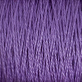 Close-up view of tightly wound, textured strands of Supreme Corp's 3/2 Pearl Cotton Yarn in purple, creating a visually rich pattern. The fibers appear slightly reflective, enhancing the depth and variation in the purple tones.