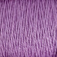 A close-up view of soft, lavender-colored 3/2 Pearl Cotton Yarn from Supreme Corp, showing the twisted and intertwined fibers on a large cone. The texture appears smooth and slightly shiny, with consistent threading throughout.