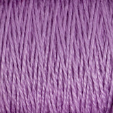 A close-up view of soft, lavender-colored 3/2 Pearl Cotton Yarn from Supreme Corp, showing the twisted and intertwined fibers on a large cone. The texture appears smooth and slightly shiny, with consistent threading throughout.