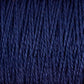 Close-up of dark blue, 3/2 Pearl Cotton Yarn from Supreme Corp. The mercerized cotton fibers appear tightly woven and have a subtle sheen, giving the yarn a smooth, almost glossy texture. The deep navy blue color is consistent throughout the image.