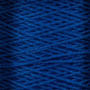 A close-up view of strands of Supreme Corp's 3/2 Pearl Cotton Yarn Mini-cone tightly wound together reveals a dense and textured pattern. The vibrant hue of the pearl cotton yarn is consistent throughout the image, showcasing the intricately intertwined threads and their fine details.