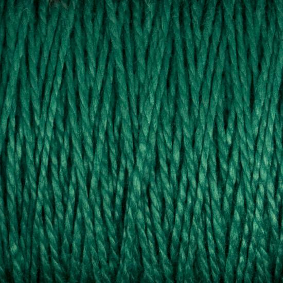 Close-up of tightly wound, green yarn from Supreme Corp's 3/2 Pearl Cotton Yarn | Large Cone. The texture reveals individual strands interwoven to create a dense and uniform pattern. This mercerized cotton yarn appears soft, with a slight sheen that reflects light, making it a versatile choice for various projects.