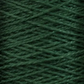 Close-up of dark green 3/2 Pearl Cotton Yarn wound into a ball, with individual strands tightly and uniformly wrapped. The texture appears soft and slightly fluffy, making it ideal for knitting or crocheting projects. This versatile yarn from Supreme Corp is perfect for creating intricate patterns and detailed designs.