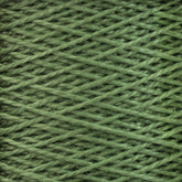 A close-up image of Supreme Corp 3/2 Pearl Cotton Yarn on a large cone, intricately wound in diagonal criss-cross patterns, showcasing a detailed texture. The yarn fibers appear soft and slightly fuzzy with varying shades of green, adding depth to the overall color. This versatile yarn is perfect for various crafting projects.