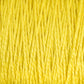 Close-up image of yellow strands of Supreme Corp's 3/2 Pearl Cotton Yarn (Large Cone) tightly aligned in a parallel arrangement, showcasing the texture and color detail of the fibers.