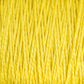 Close-up image of multiple strands of Supreme Corp's 3/2 Pearl Cotton Yarn in bright yellow, tightly packed together, creating a vibrant and textured pattern on a mini-cone.