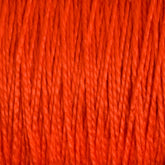 A close-up view of 3/2 Pearl Cotton Yarn | Large Cone by Supreme Corp reveals orange-threaded, mercerized cotton yarn with tightly packed vertical strands, creating a textured pattern. The rich hue of orange is consistent throughout the image, showcasing the detailed fibers and smooth appearance of this versatile yarn.