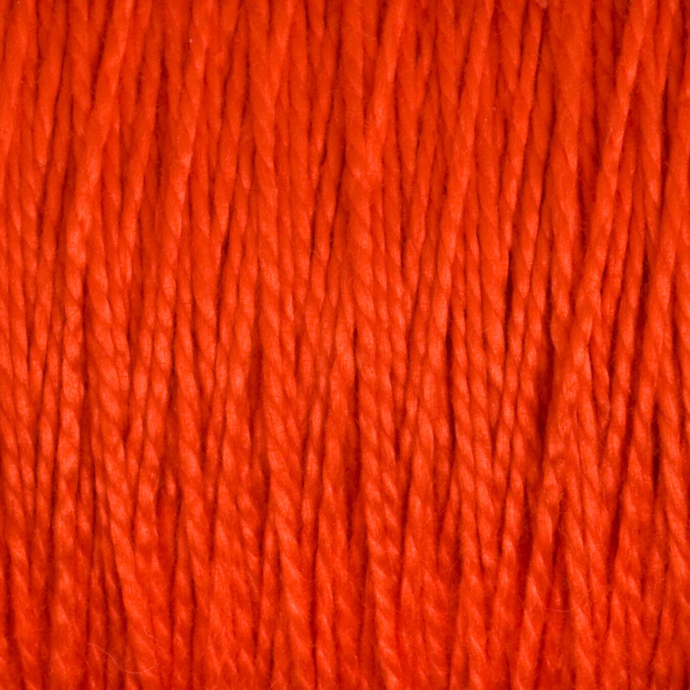 A close-up view of 3/2 Pearl Cotton Yarn | Large Cone by Supreme Corp reveals orange-threaded, mercerized cotton yarn with tightly packed vertical strands, creating a textured pattern. The rich hue of orange is consistent throughout the image, showcasing the detailed fibers and smooth appearance of this versatile yarn.