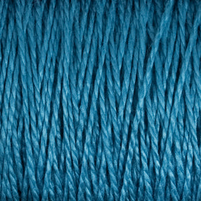 A close-up view of multiple strands of Supreme Corp's 3/2 Pearl Cotton Yarn | Mini-cone in blue, arranged vertically. The texture appears soft and slightly shiny, with tightly twisted threads creating a uniform, woven appearance.