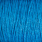 Close-up of bright blue 3/2 Pearl Cotton Yarn from Supreme Corp strands. The yarn appears tightly twisted and slightly shiny, creating a uniform, textured pattern throughout the image. The vibrant color and close-up perspective highlight the intricate details of this versatile yarn's fibers on a large cone.