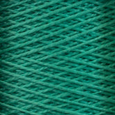 Close-up of tightly wound 3/2 Pearl Cotton Yarn | Mini-cone by Supreme Corp, showcasing the detailed texture and interwoven strands. This versatile yarn has a rich, emerald color, with variations in shade that create a sense of depth and dimension in the image.