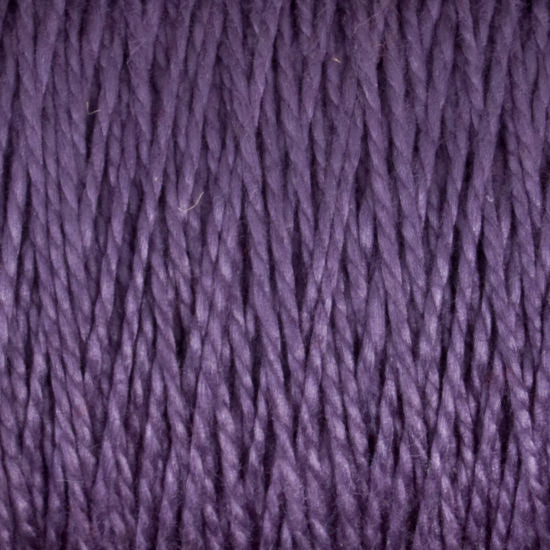 Close-up of the deep purple 3/2 Pearl Cotton Yarn from Supreme Corp, featuring mercerized cotton fibers that are tightly wound and neatly arranged in parallel strands. The texture appears soft and smooth, indicating a fine quality material suitable for knitting or crochet projects.