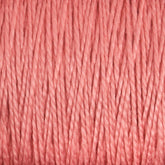 Close-up image of pink yarn strands tightly wound together, forming a neatly organized pattern showcasing the texture and fine detail of the fibers. This versatile 3/2 Pearl Cotton Yarn from Supreme Corp appears smooth and slightly shiny.