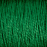 Close-up image of Supreme Corp's 3/2 Pearl Cotton Yarn (Mini-cone) in green. The tightly wound threads showcase the textured fibers, revealing detailed striations and nuances of the high-quality mercerized cotton yarn.