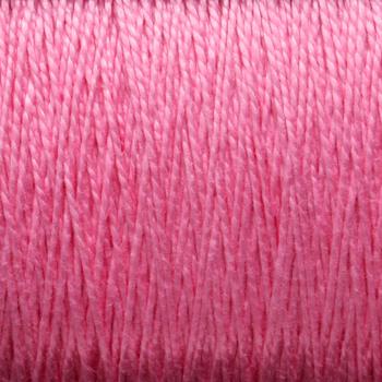 Close-up image of a spool of pink thread, showcasing the texture and tightly wound strands. The 3/2 Pearl Cotton Yarn from Supreme Corp appears to be made from mercerized cotton, with a slightly shiny surface, and is tightly packed together on a large cone.