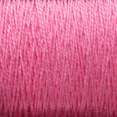 Close-up of tightly wound 3/2 Pearl Cotton Yarn | Mini-cone from Supreme Corp, revealing the texture and individual strands. The yarn appears smooth and glossy, with a slightly reflective surface, and the vibrant pink color remains consistent throughout.