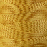 Close-up image of a large cone of 5/2 Pearl Cotton Yarn by Supreme Corp. The thick, mercerized cotton threads are tightly wound around the cone, forming a textured pattern with diagonal lines and crisscrossed sections. The yarn exhibits a slight sheen that subtly reflects light.