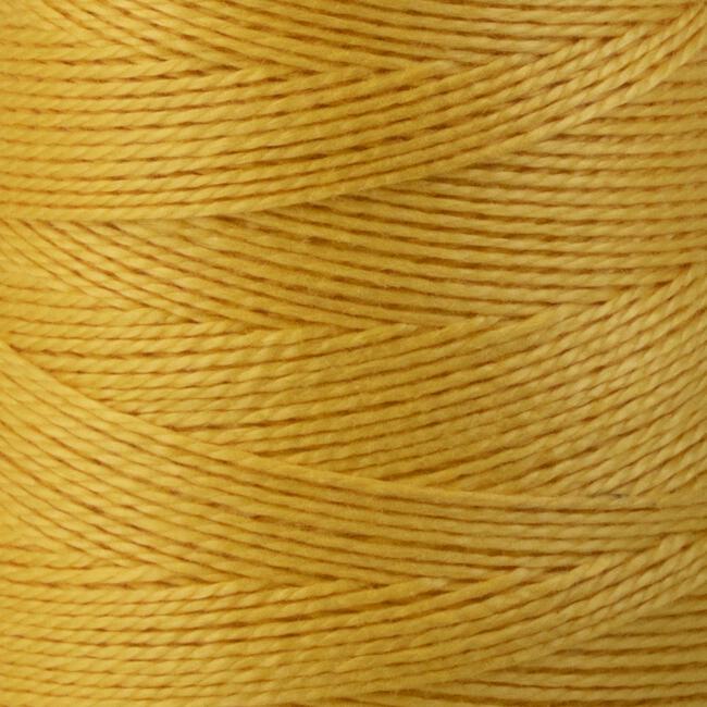 Close-up image of a large cone of 5/2 Pearl Cotton Yarn by Supreme Corp. The thick, mercerized cotton threads are tightly wound around the cone, forming a textured pattern with diagonal lines and crisscrossed sections. The yarn exhibits a slight sheen that subtly reflects light.