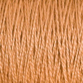 A close-up view of multiple strands of Supreme Corp’s 5/2 Pearl Cotton Yarn | Large Cone in light brown, tightly wound together, showcasing their texture and thickness. The fibers appear soft and smooth, making this versatile yarn ideal for knitting or crocheting projects.