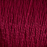 Close-up image of thick, red 5/2 Pearl Cotton Yarn from Supreme Corp, tightly wound in a parallel pattern on a large cone. The yarn has a rich, deep color and a slightly shiny texture, revealing individual twisted strands that provide a sense of both warmth and softness.