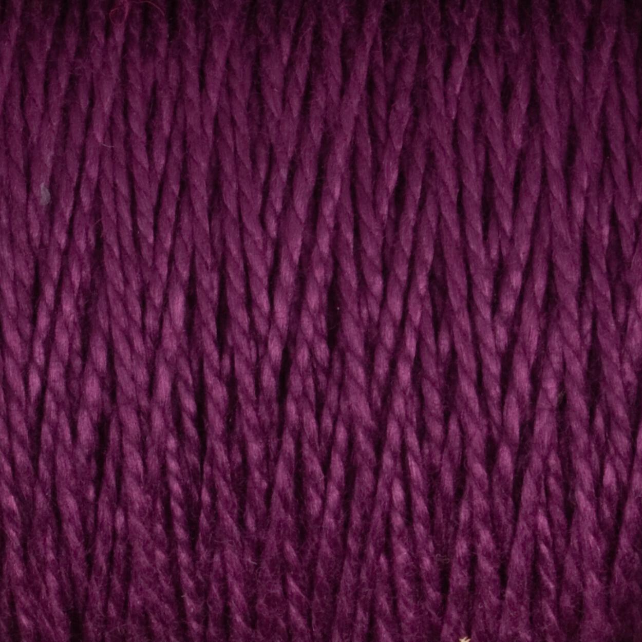 Close-up view of a purple skein of Supreme Corp's 5/2 Pearl Cotton Yarn | Large Cone, showcasing its tightly wound, fibrous texture and rich color. The strands are neatly aligned, emphasizing the material's smooth and soft appearance.