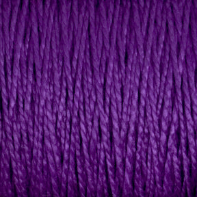 Close-up image of Supreme Corp's 5/2 Pearl Cotton Yarn | Mini-cone in purple, showcasing tightly wound, textured fibers running vertically across the frame. The mercerized cotton yarn appears soft and slightly shiny, with rich, vibrant coloration—perfect for intricate weaving projects.