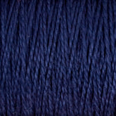 Close-up image of Supreme Corp's 5/2 Pearl Cotton Yarn | Large Cone in dark blue. The strands are closely packed and displayed vertically, showcasing a slightly textured, twisted pattern. This versatile yarn is deep and rich in color with subtle variations in shading, making it perfect for any project requiring quality materials.