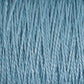 A close-up image of Supreme Corp's 5/2 Pearl Cotton Yarn | Large Cone in light blue, showcasing the detailed texture and individual strands twisted together. The material appears soft and smooth, with a consistent, evenly spun appearance that highlights the yarn's versatile quality and sheen.