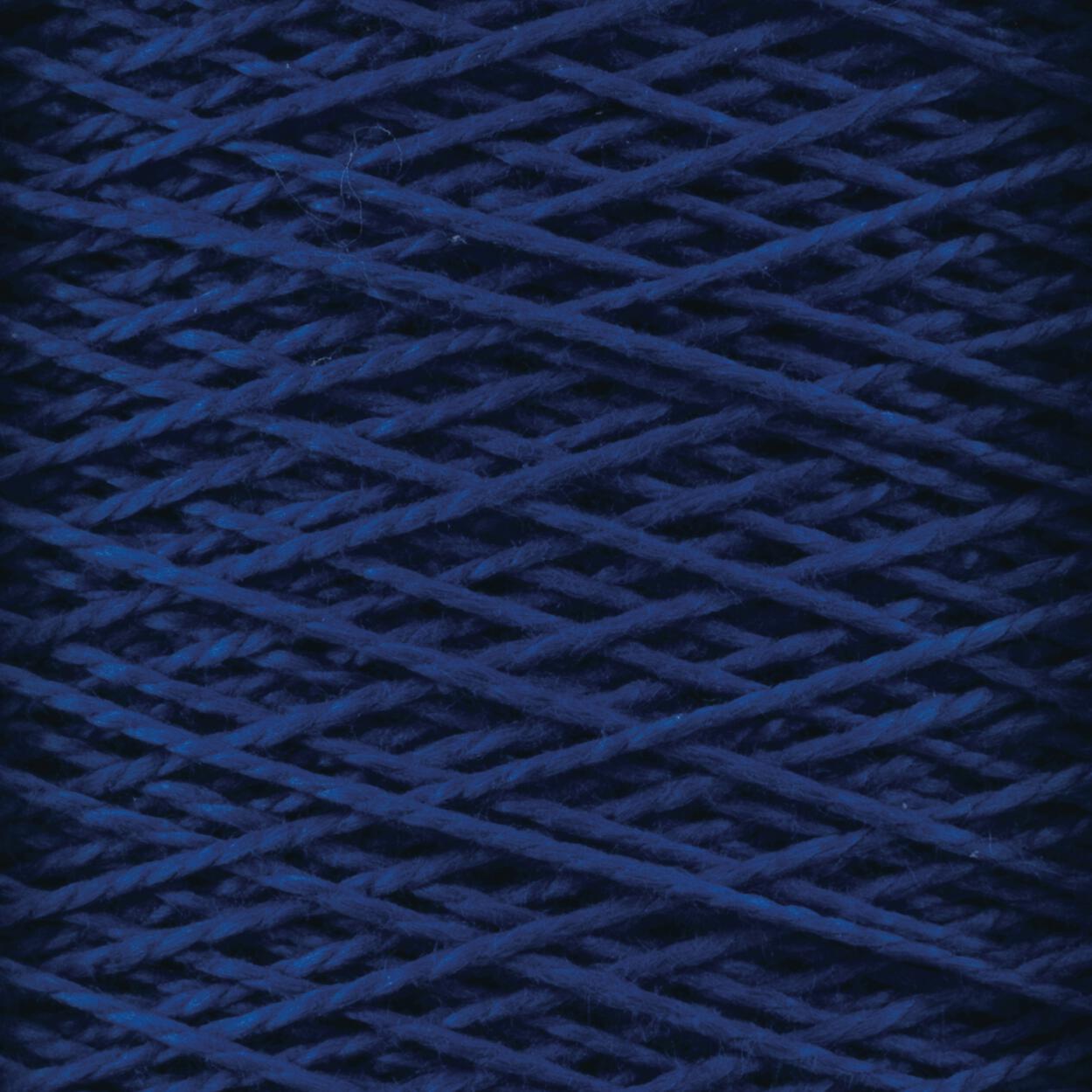 Close-up view of a spool of dark blue 5/2 Pearl Cotton Yarn from Supreme Corp. The tightly wound threads on the large cone form a crisscross pattern, creating an intricate texture. The image highlights the fibers and details of this versatile yarn.