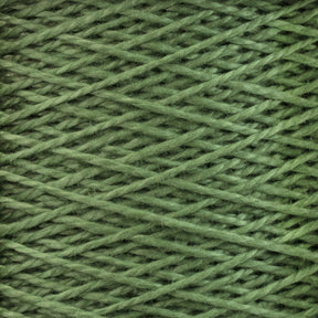 Close-up image of Supreme Corp's 5/2 Pearl Cotton Yarn wound tightly in a crisscross pattern on a mini-cone. The texture is visible, with individual fibers and a slightly fuzzy surface apparent. The rich green color is even throughout, ideal for weaving projects that demand a uniform appearance.