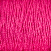 Close-up view of thick, pink, 5/2 Pearl Cotton Yarn from Supreme Corp densely wrapped together, showing textured strands and fibers intertwined.