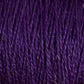 Close-up of Supreme Corp's 5/2 Pearl Cotton Yarn in purple, showcasing tightly woven strands and varying shades that create a textured appearance. Some loose fibers are visible, adding intricate detail to the yarn on the large cone.